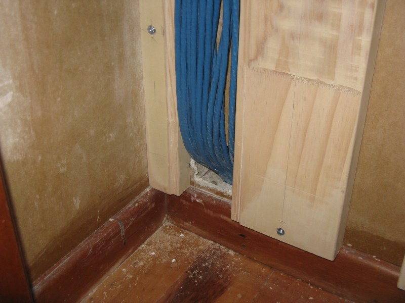 Cables from wall cavity